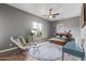 Stylish bedroom featuring hardwood floors, comfortable furniture, and a cozy atmosphere at 2255 N Hillridge --, Mesa, AZ 85207