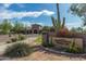 The Mountain Bridge Owners Club features beautiful landscaping, a welcoming entrance, and community amenities at 2255 N Hillridge --, Mesa, AZ 85207