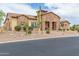 Beautiful stone home with drought resistant landscaping and a tile roof at 2255 N Hillridge --, Mesa, AZ 85207