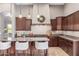 Gourmet kitchen featuring granite countertops, stainless steel appliances, and a center island with seating at 2255 N Hillridge --, Mesa, AZ 85207