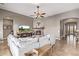 Open concept living room with fireplace, comfortable seating, and seamless flow to other areas at 2255 N Hillridge --, Mesa, AZ 85207