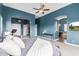 Spacious main bedroom with an ensuite bathroom, plush bedding, and ample space at 2255 N Hillridge --, Mesa, AZ 85207