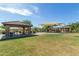 Community playground area with shaded picnic spots, perfect for Gathering outings and recreational activities at 2255 N Hillridge --, Mesa, AZ 85207