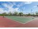 Well-maintained tennis court with clear lines and sturdy netting, ready for a competitive match at 2255 N Hillridge --, Mesa, AZ 85207