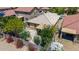 Aerial view of house with concrete patio, landscaping and tile roof at 2421 W Romley Rd, Phoenix, AZ 85041