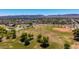 Aerial view of a park with green space and a playground at 2421 W Romley Rd, Phoenix, AZ 85041
