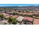 Aerial view of a desert community with mountain views at 2421 W Romley Rd, Phoenix, AZ 85041