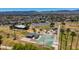 Aerial view of a park with green space, playground, and basketball court at 2421 W Romley Rd, Phoenix, AZ 85041