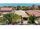 Aerial view of single Gathering home featuring a tile roof and desert landscaping at 2421 W Romley Rd, Phoenix, AZ 85041