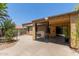 Covered patio with concrete flooring, block wall accents and black screen at 2421 W Romley Rd, Phoenix, AZ 85041