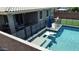 A beautiful backyard oasis with a refreshing pool, an outdoor living area, and a secure pool fence at 31324 N 26 Glen Gln, Phoenix, AZ 85085