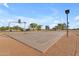 Community basketball court offers a recreational space for sports and activities for residents and families in the neighborhood at 3373 W Five Mile Peak Dr, San Tan Valley, AZ 85144