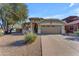 Charming single-story home with desert landscaping and a two-car garage at 3373 W Five Mile Peak Dr, San Tan Valley, AZ 85144
