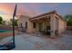 Backyard showcasing patio, seating area, basketball hoop, and pool, ideal for outdoor living at 3438 W Little Hopi Dr, Phoenix, AZ 85086