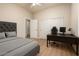 Comfortable bedroom boasting closet, modern desk and chair with hard floors at 3438 W Little Hopi Dr, Phoenix, AZ 85086