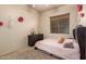 bedroom featuring carpet, plush bed, and dresser, all with fun decorations at 3438 W Little Hopi Dr, Phoenix, AZ 85086
