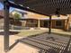 Backyard featuring a patio with a pergola and a pool with a spa for relaxation and entertainment at 35743 W Cartegna Ln, Maricopa, AZ 85138