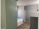 Bathroom featuring tub and shower at 35743 W Cartegna Ln, Maricopa, AZ 85138