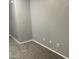 Bedroom featuring gray walls, carpet flooring and multiple electrical outlets at 35743 W Cartegna Ln, Maricopa, AZ 85138