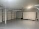 Spacious garage with sealed floor and lots of room for parking and storage at 35743 W Cartegna Ln, Maricopa, AZ 85138