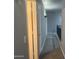 Hallway with carpet and neutral paint at 35743 W Cartegna Ln, Maricopa, AZ 85138