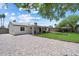 Spacious backyard featuring low-maintenance desert landscaping and a small turf area, perfect for enjoying the outdoors at 3850 E Ludlow Dr, Phoenix, AZ 85032