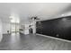 Open floor plan with stylish wall design in the living room and renovated kitchen at 3850 E Ludlow Dr, Phoenix, AZ 85032