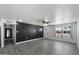 A bright living room features a statement wall and fresh paint at 3850 E Ludlow Dr, Phoenix, AZ 85032