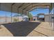 Large carport offers ample covered parking space, storage, and protection from the elements at 4025 E Surrey Ave, Phoenix, AZ 85032