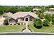 Stunning aerial view of a well-maintained home with lush landscaping, a grand entrance, and beautiful curb appeal at 4040 E Mclellan Rd # 16, Mesa, AZ 85205