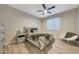 Cozy bedroom with ceiling fan, window with blinds, and stylish furnishings at 4040 E Mclellan Rd # 16, Mesa, AZ 85205
