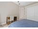 Bedroom featuring a desk, view to another room, and closet space at 4040 E Mclellan Rd # 16, Mesa, AZ 85205