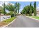 Gated community entrance surrounded by lush landscaping and manicured lawns, providing a secure and inviting neighborhood setting at 4040 E Mclellan Rd # 16, Mesa, AZ 85205