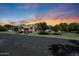 Beautiful single-Gathering home with a well-manicured lawn, mature trees, and a three-car garage, offering comfortable living at 4040 E Mclellan Rd # 16, Mesa, AZ 85205