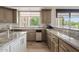 Bright kitchen featuring granite countertops, stainless steel appliances, and lots of natural light at 4040 E Mclellan Rd # 16, Mesa, AZ 85205