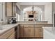 Modern kitchen with granite counters, wood cabinets, and stainless steel appliances at 4040 E Mclellan Rd # 16, Mesa, AZ 85205