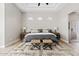 Comfortable main bedroom featuring a plush rug, stylish furnishings, and views to the ensuite at 4040 E Mclellan Rd # 16, Mesa, AZ 85205