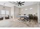 Serene main bedroom with a ceiling fan, wood floors, and natural light at 4040 E Mclellan Rd # 16, Mesa, AZ 85205