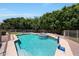 Inviting pool area with spa and lush greenery, perfect for relaxation and recreation at 4040 E Mclellan Rd # 16, Mesa, AZ 85205
