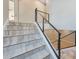 Modern staircase with wood-look tile steps and sleek cable railing system at 4040 E Mclellan Rd # 16, Mesa, AZ 85205