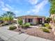Charming single-story home boasts manicured landscaping and appealing desert-style front yard at 41318 N Belfair Way, Anthem, AZ 85086