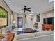 Comfortable living room with modern furniture and natural light from a skylight at 41318 N Belfair Way, Anthem, AZ 85086