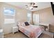 Sunlit bedroom featuring a comfortable bed with sky views at 43525 W Cydnee Dr, Maricopa, AZ 85138