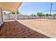 Backyard featuring a covered patio and gravel landscaping at 461 W Lindbergh Ave, Coolidge, AZ 85128