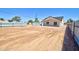 Large backyard of the property features dirt landscaping at 461 W Lindbergh Ave, Coolidge, AZ 85128