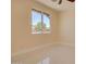 Bright bedroom featuring neutral walls, sleek tile flooring and a large window with natural light at 461 W Lindbergh Ave, Coolidge, AZ 85128