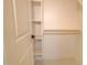 Walk-in closet with adjustable shelving and rods, offering ample storage space at 461 W Lindbergh Ave, Coolidge, AZ 85128
