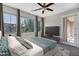 Comfortable bedroom featuring large windows, neutral color scheme, and a ceiling fan at 4777 S Fulton Ranch Blvd # 2071, Chandler, AZ 85248