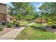 Lush green common area with mature trees, plants, and walkways at 4777 S Fulton Ranch Blvd # 2071, Chandler, AZ 85248