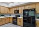 Well-equipped kitchen showcasing sleek appliances, light wood cabinetry, and stylish countertops at 4777 S Fulton Ranch Blvd # 2071, Chandler, AZ 85248
